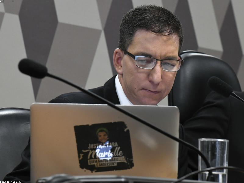 Space black M3 MacBook Pro sitting on a desk